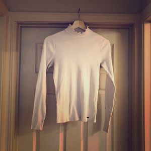 White turtle neck